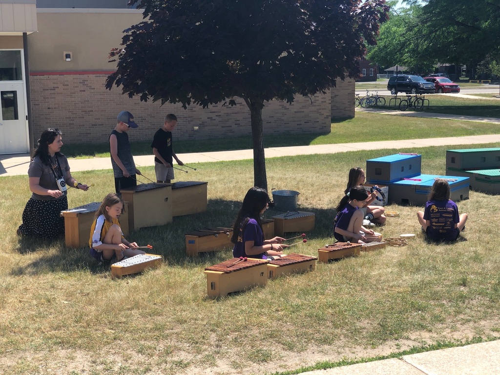 students playing xylophones